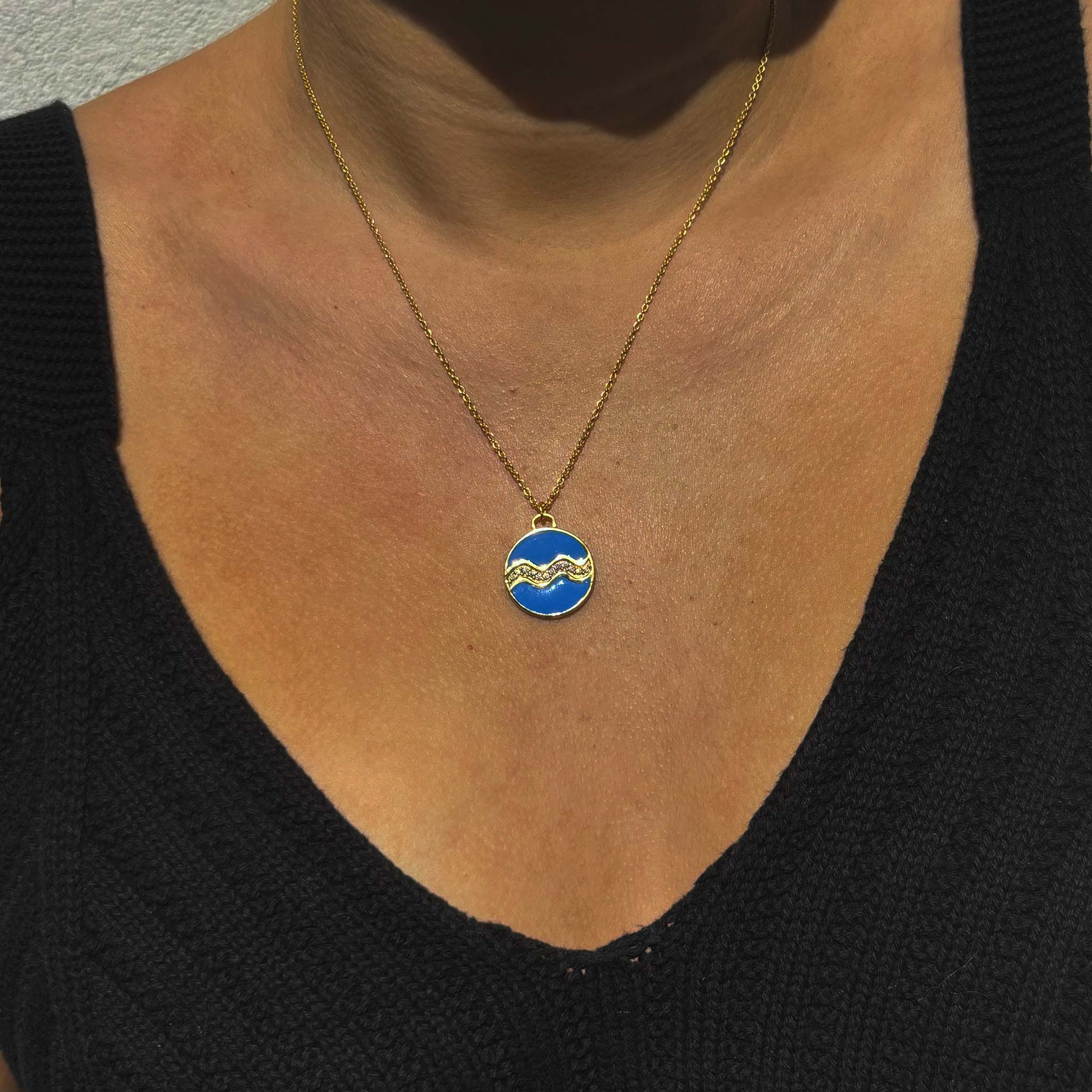 Celestial Aquarius Necklace – Gold Water Bearer with Aqua Blue Enamel