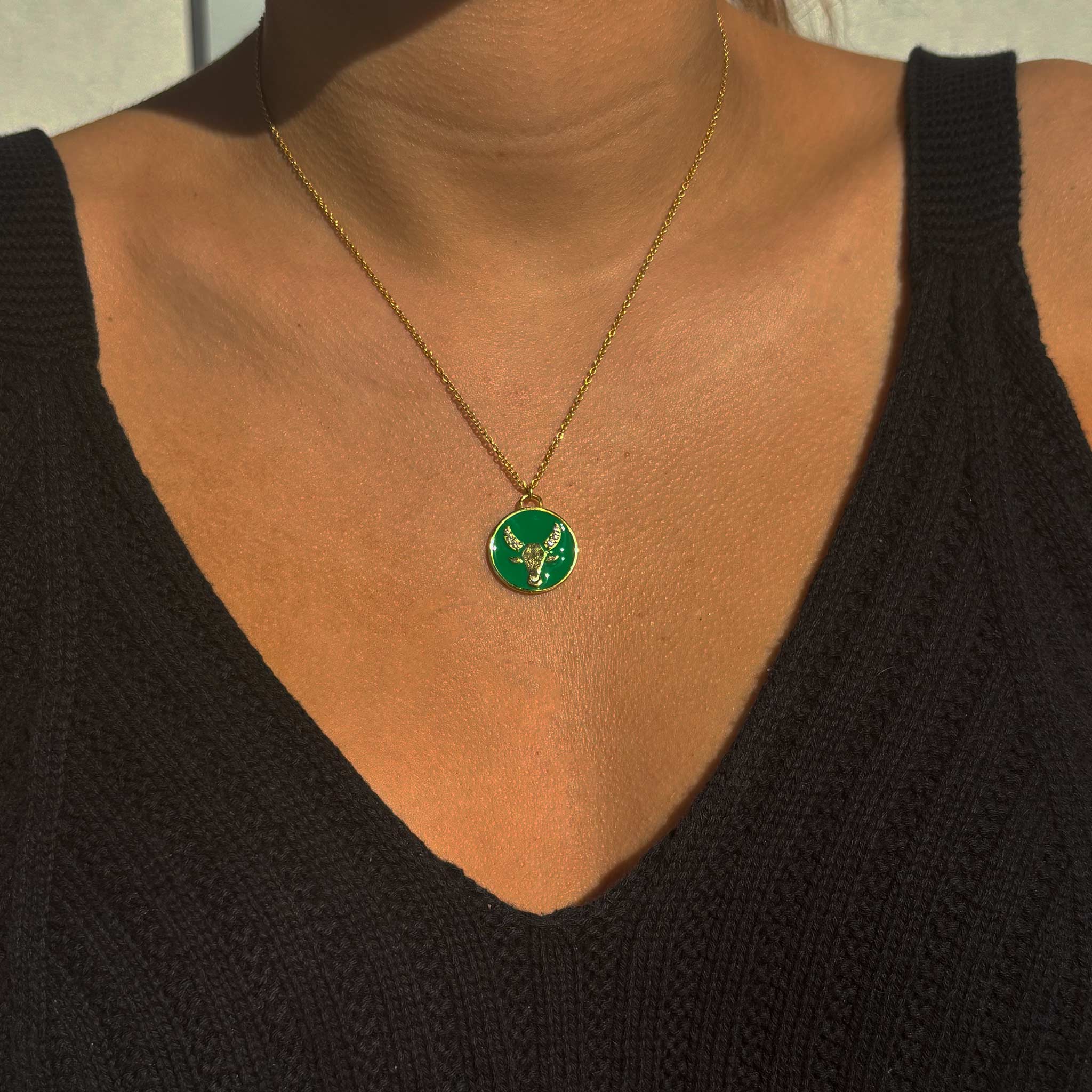 Celestial Taurus Necklace – Gold Bull with Emerald Enamel Brilliance